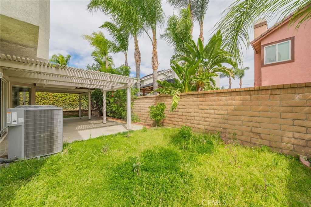6771 Galveston Place Rancho Cucamonga, CA 91701 - Photo 31 of 38 a view of a backyard with plants