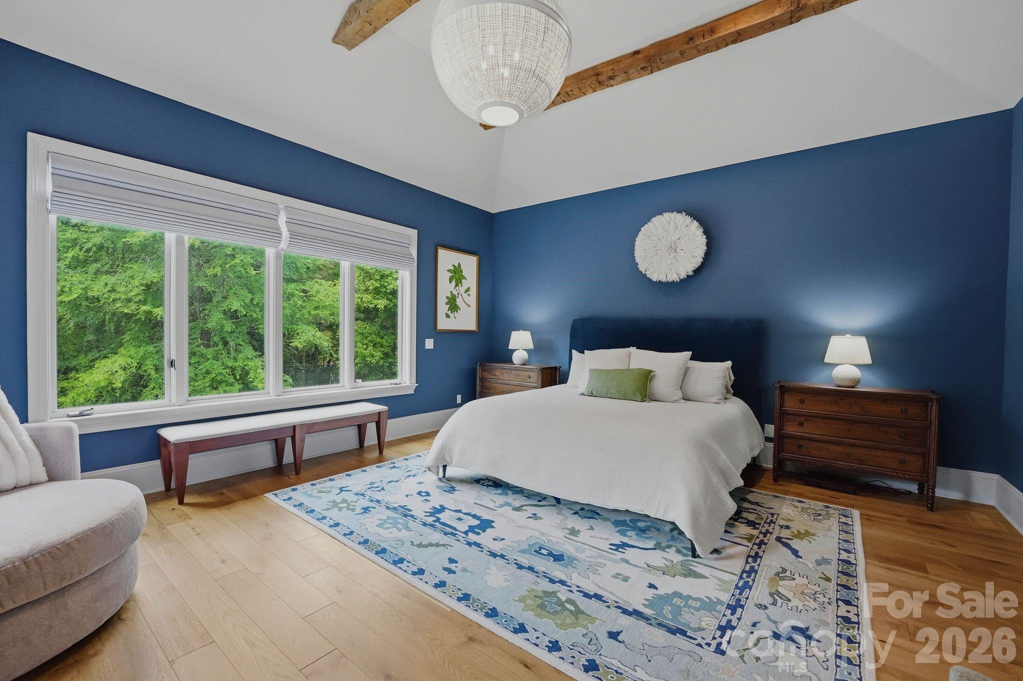 7416 Lee Rea Road Charlotte, NC 28226 - Photo 28 of 48 a bedroom with a large bed and a large window