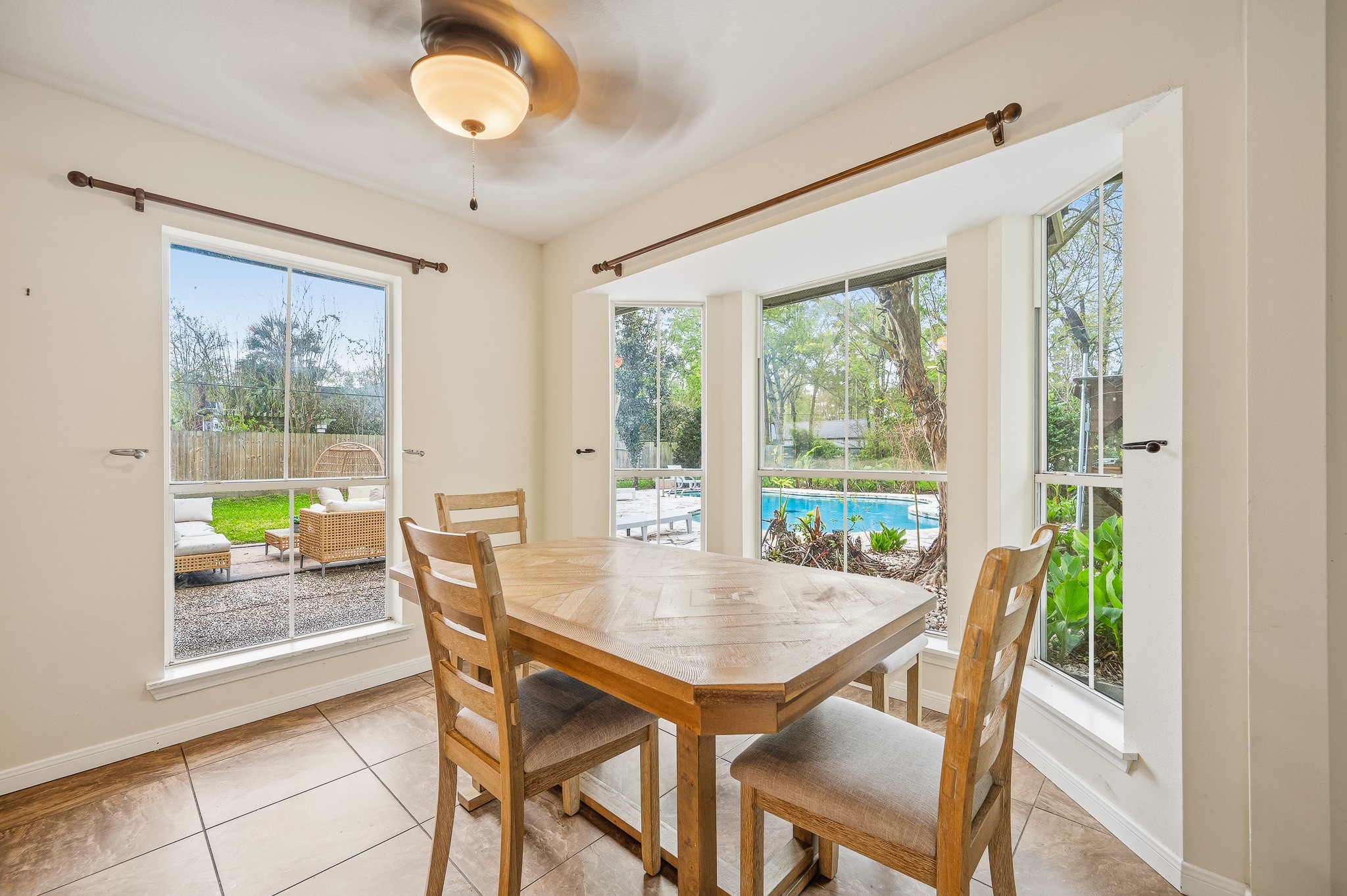 16811 Waycreek Road Houston, TX 77068 - Photo 28 of 50 a view of a dining room with furniture window and outside view