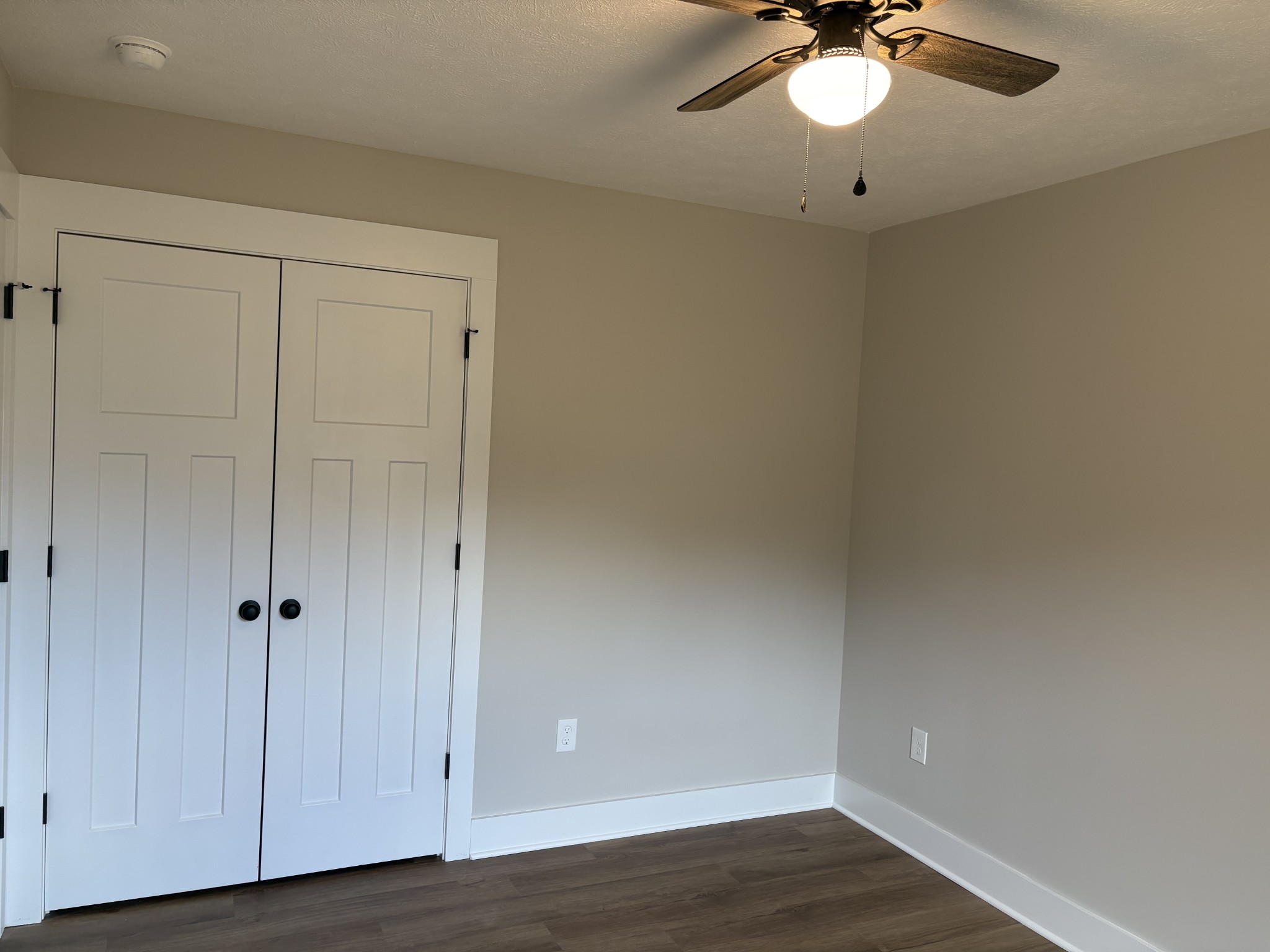 2264 Collier Road Cornersville, TN 37047 - Photo 19 of 20 a view of an empty room with wooden floor