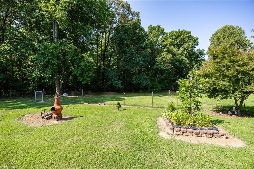 545 Mt Shepherd Road Asheboro, NC 27205 - Photo 39 of 49 Backyard with partial fenced area