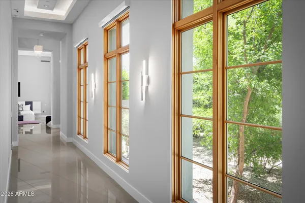 a bedroom with furniture and a window