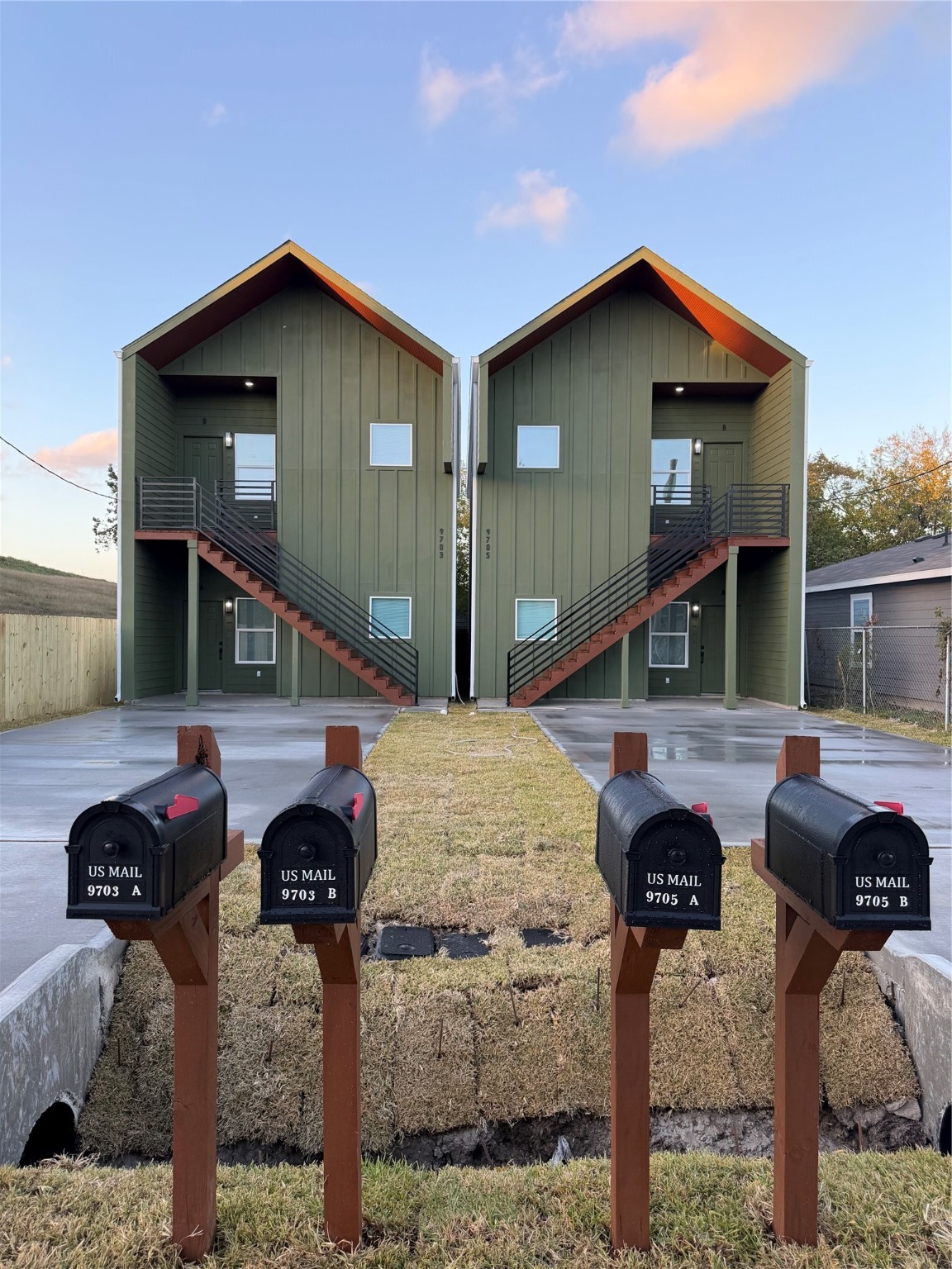 a front view of a house with parking