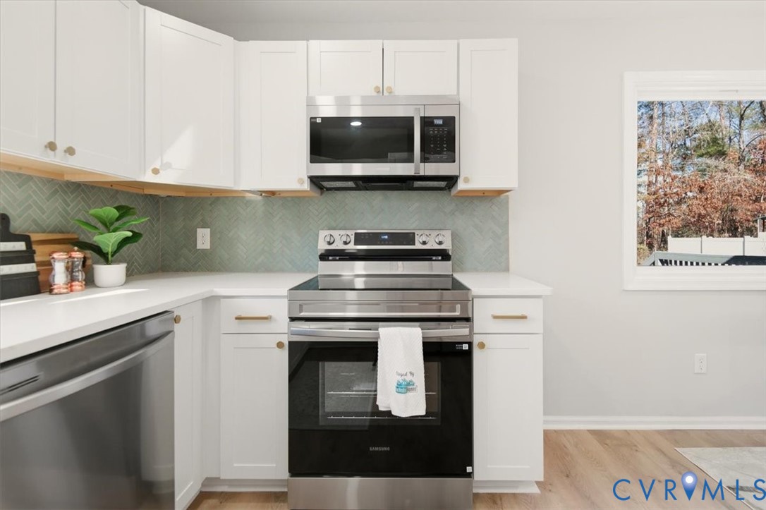 5712 Retriever Road Richmond, VA 23237 - Photo 16 of 40 Kitchen featuring appliances with stainless steel
