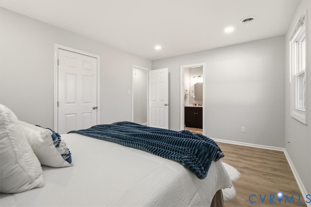 5712 Retriever Road Richmond, VA 23237 - Photo 31 of 40 Bedroom with wood finished floors, recessed lighti