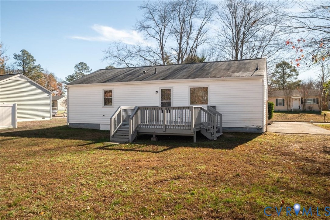 5712 Retriever Road Richmond, VA 23237 - Photo 36 of 40 Back of property featuring a wooden deck and a yar