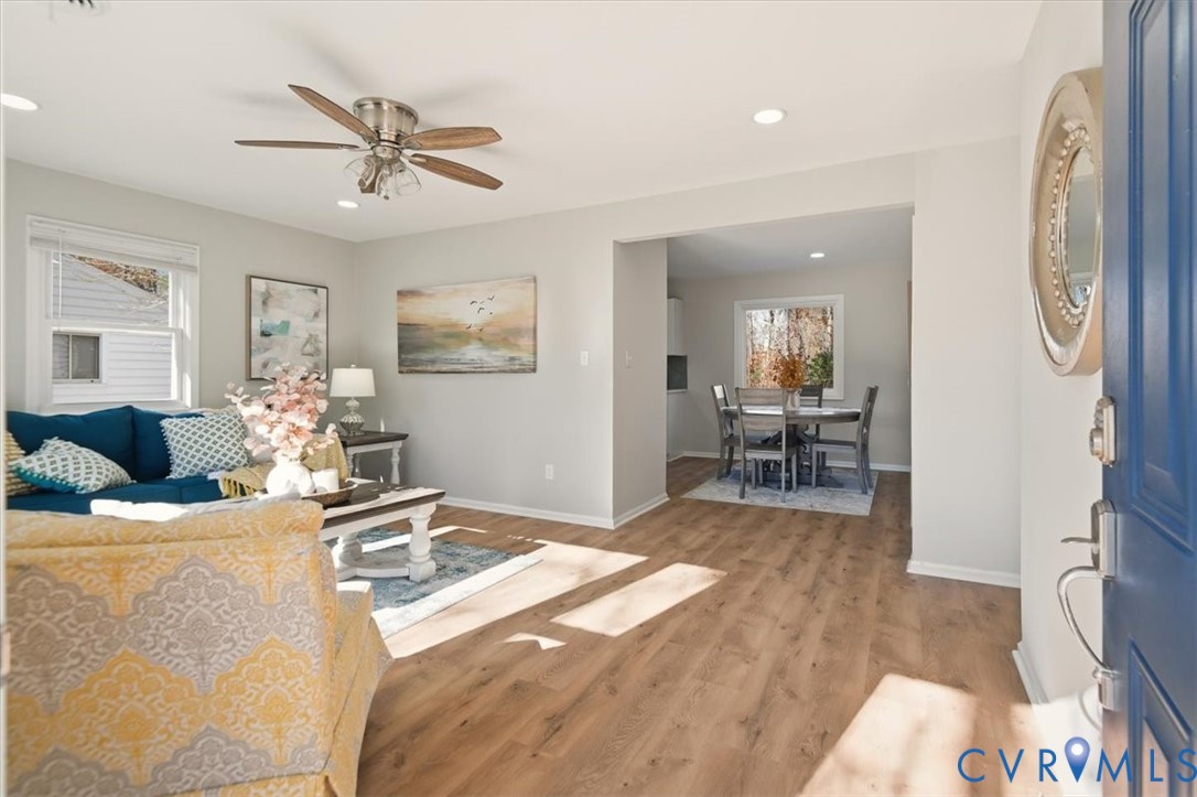 5712 Retriever Road Richmond, VA 23237 - Photo 4 of 40 Living area with light wood-style flooring, ceilin