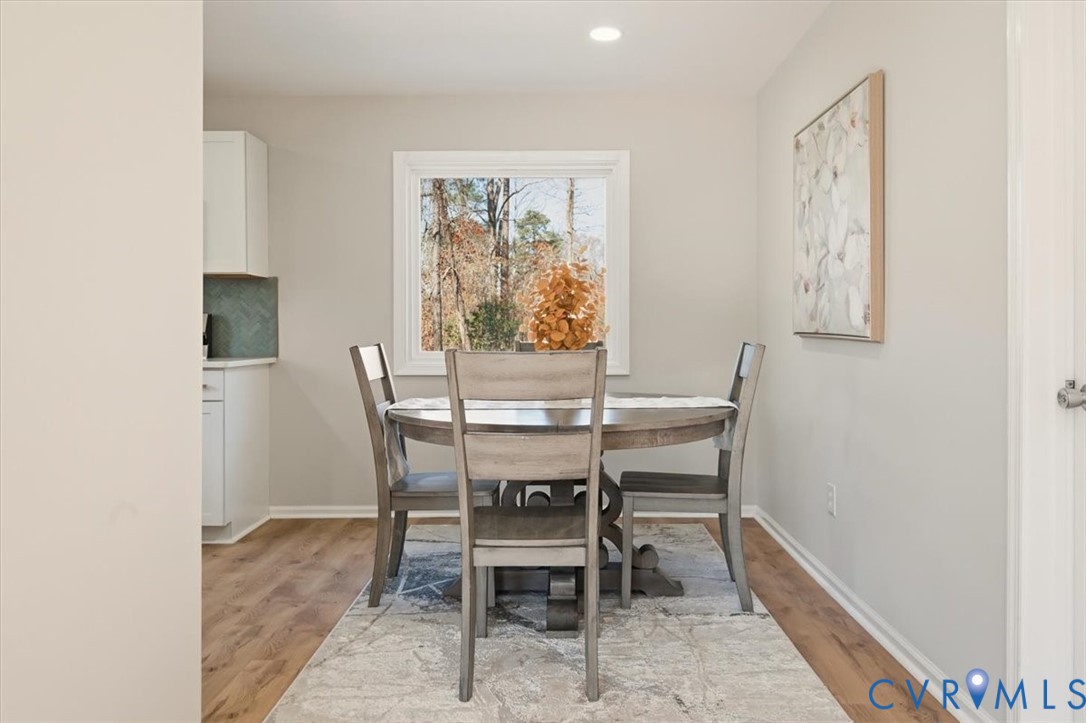 5712 Retriever Road Richmond, VA 23237 - Photo 9 of 40 Dining area featuring light wood-style flooring an