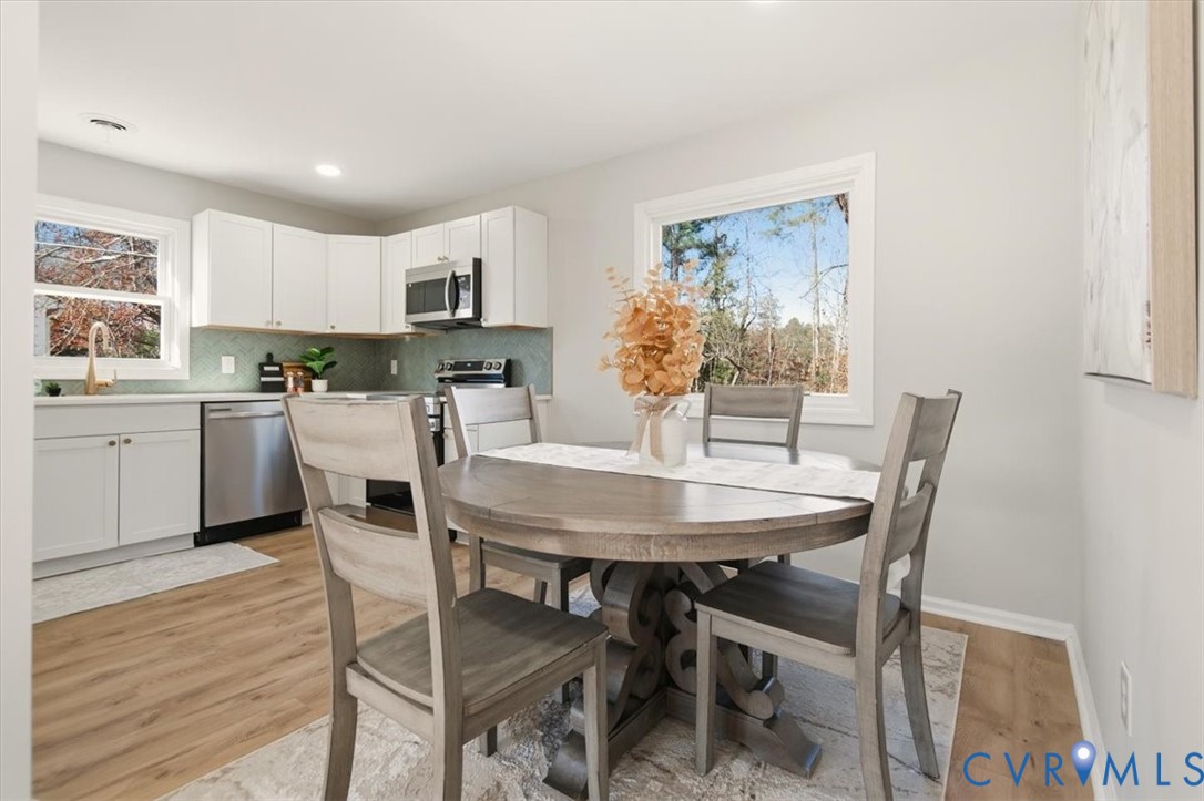 5712 Retriever Road Richmond, VA 23237 - Photo 10 of 40 Dining area featuring light wood-type flooring and