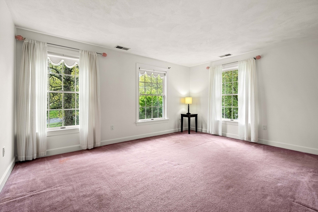 37 Old Planters Road Beverly, MA 01915 - Photo 30 of 42 an empty room with windows