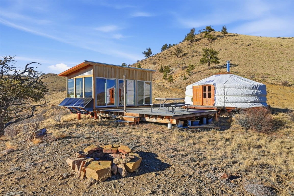 3490 Clear Creek Road Hartsel, CO 80449 - Photo 18 of 39 a swimming pool with buildings in the background