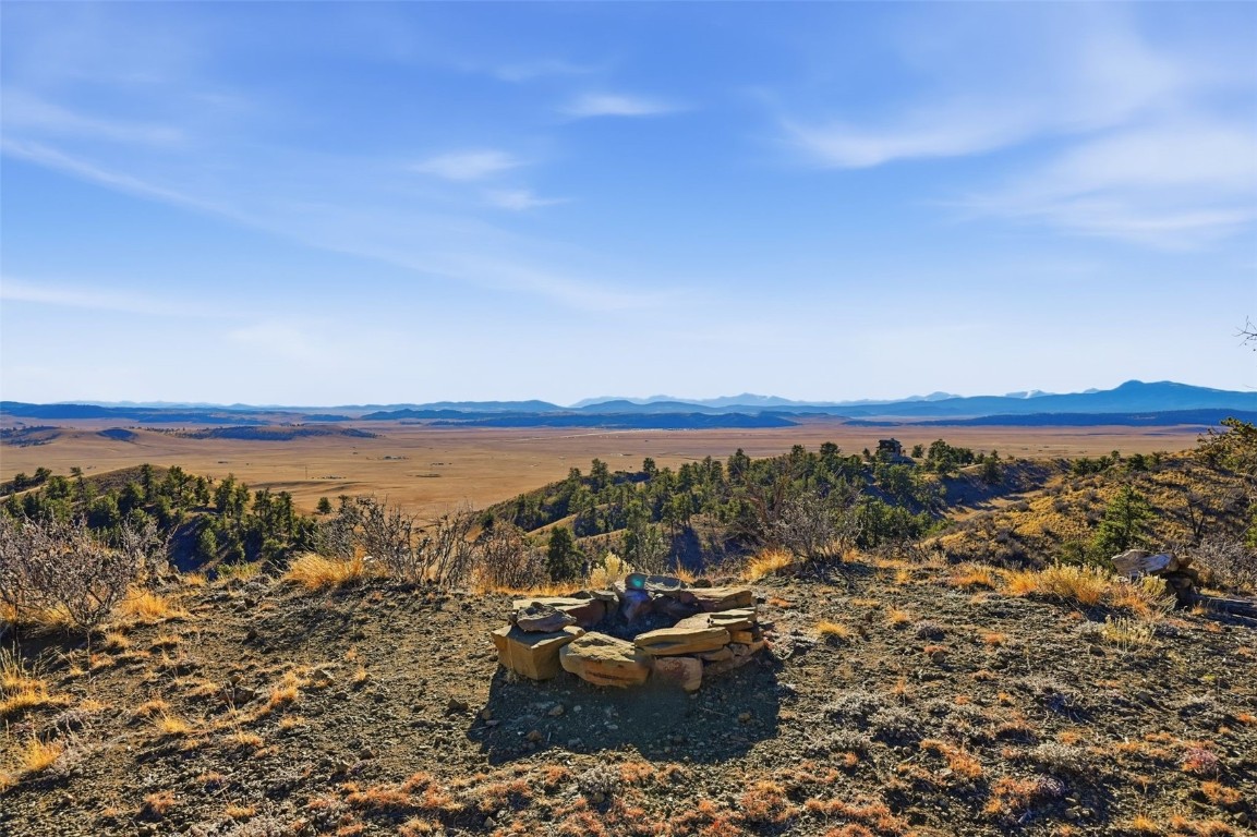 3490 Clear Creek Road Hartsel, CO 80449 - Photo 19 of 39 a view of a lake with mountain in the back