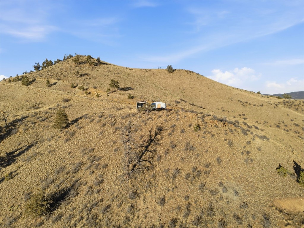 3490 Clear Creek Road Hartsel, CO 80449 - Photo 22 of 39 a view of a large mountain with mountains in the background