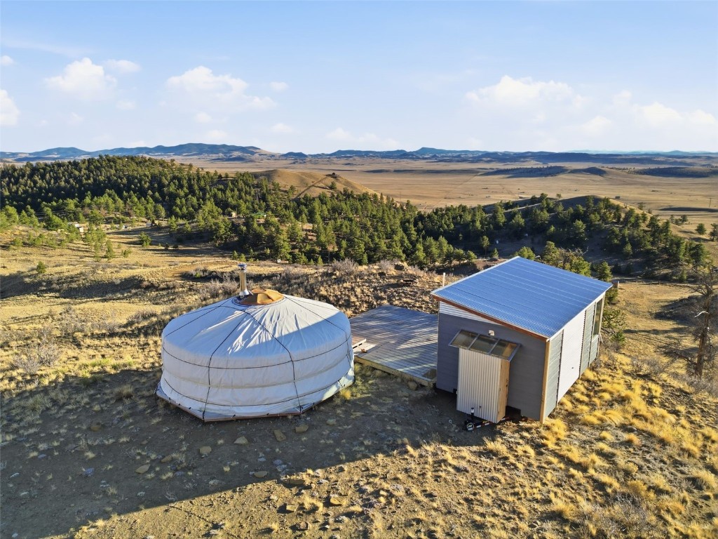 3490 Clear Creek Road Hartsel, CO 80449 - Photo 3 of 39 swimming pool view with a lake view