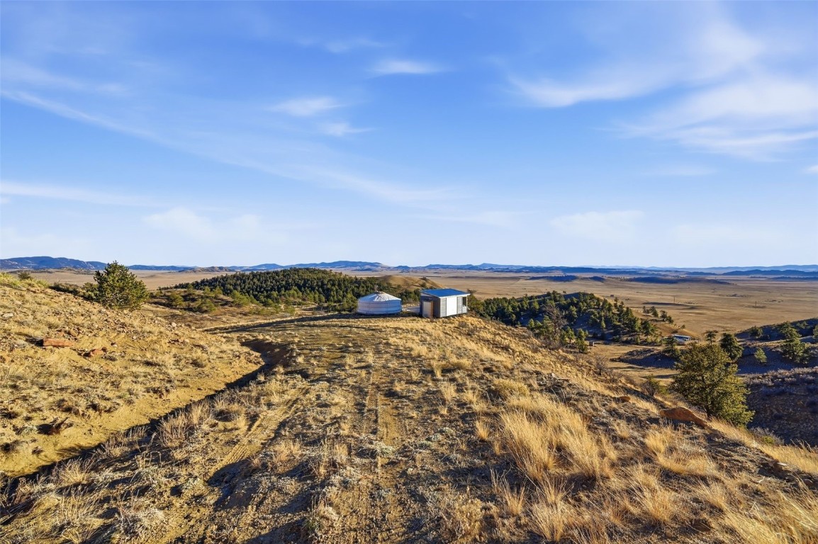 3490 Clear Creek Road Hartsel, CO 80449 - Photo 35 of 39 a view of a large body of water with lots of trees in all around