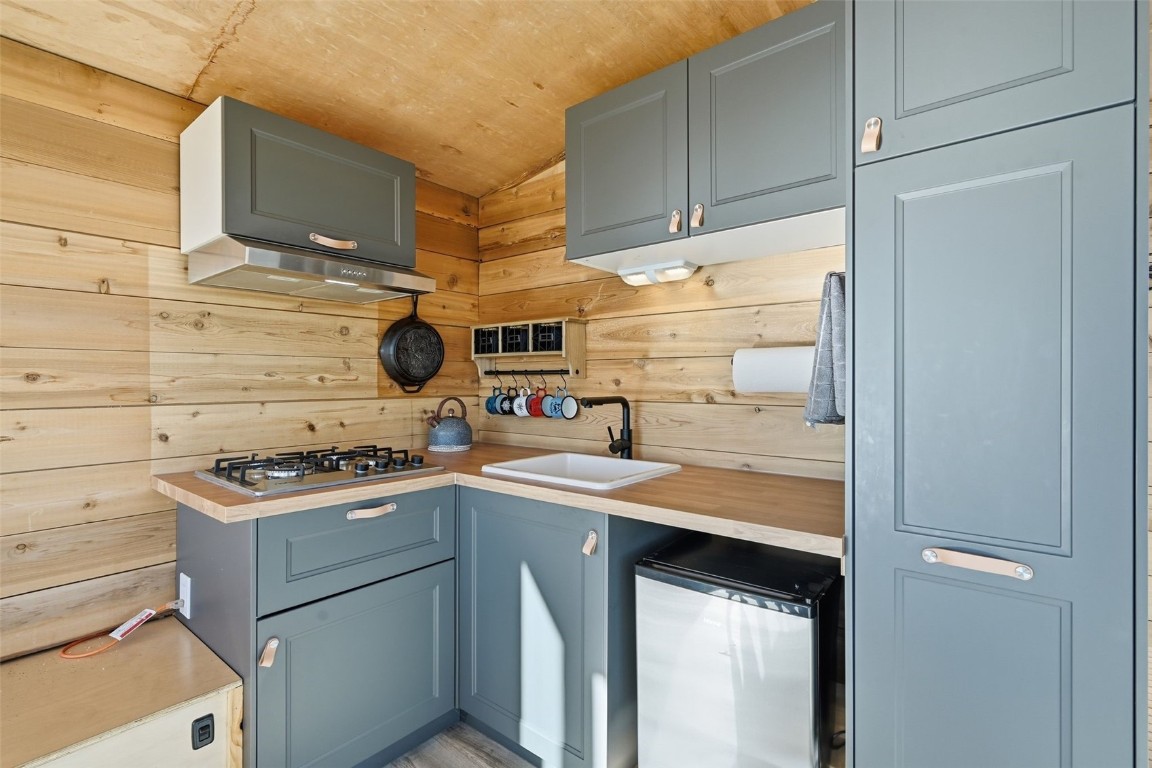 3490 Clear Creek Road Hartsel, CO 80449 - Photo 10 of 39 a kitchen with stainless steel appliances granite countertop a stove and a sink