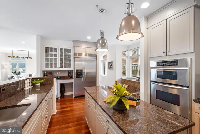 a bedroom with a bed and lamp