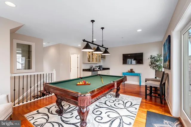 a view of a living room and a large window