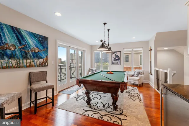 a view of a balcony with two chairs