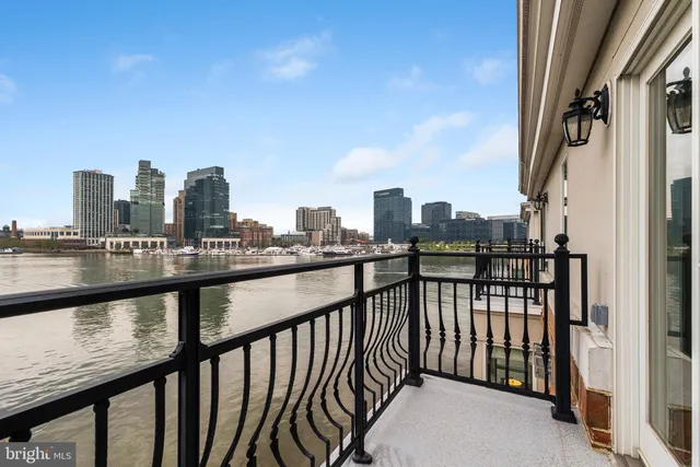 a view of a brick building with many windows