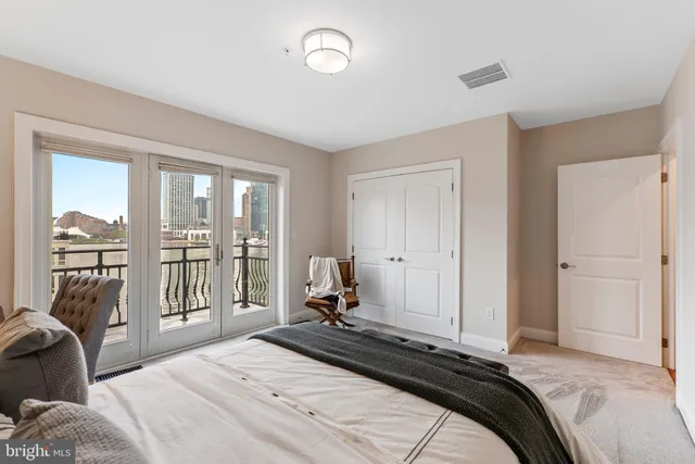 a view of a city with a lake