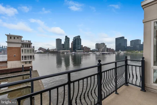 a kitchen with a sink a counter and appliances