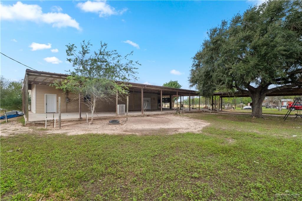 7654 East Alberta Road Edinburg, TX 78542 - Photo 17 of 33 a view of a house with a yard