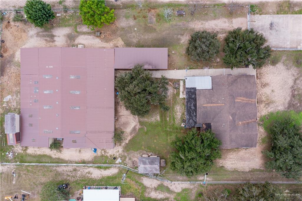 7654 East Alberta Road Edinburg, TX 78542 - Photo 5 of 33 an aerial view of a house with a yard and a large tree