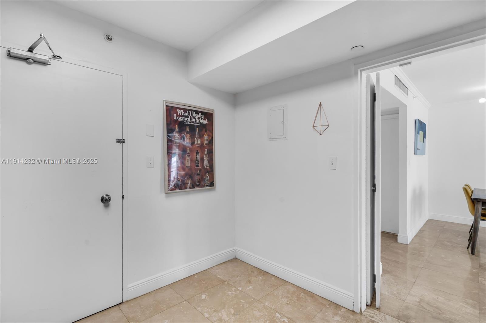 5101 Collins Avenue, Unit 12U Miami Beach, FL 33140 - Photo 5 of 26 a view of a hallway with closet area