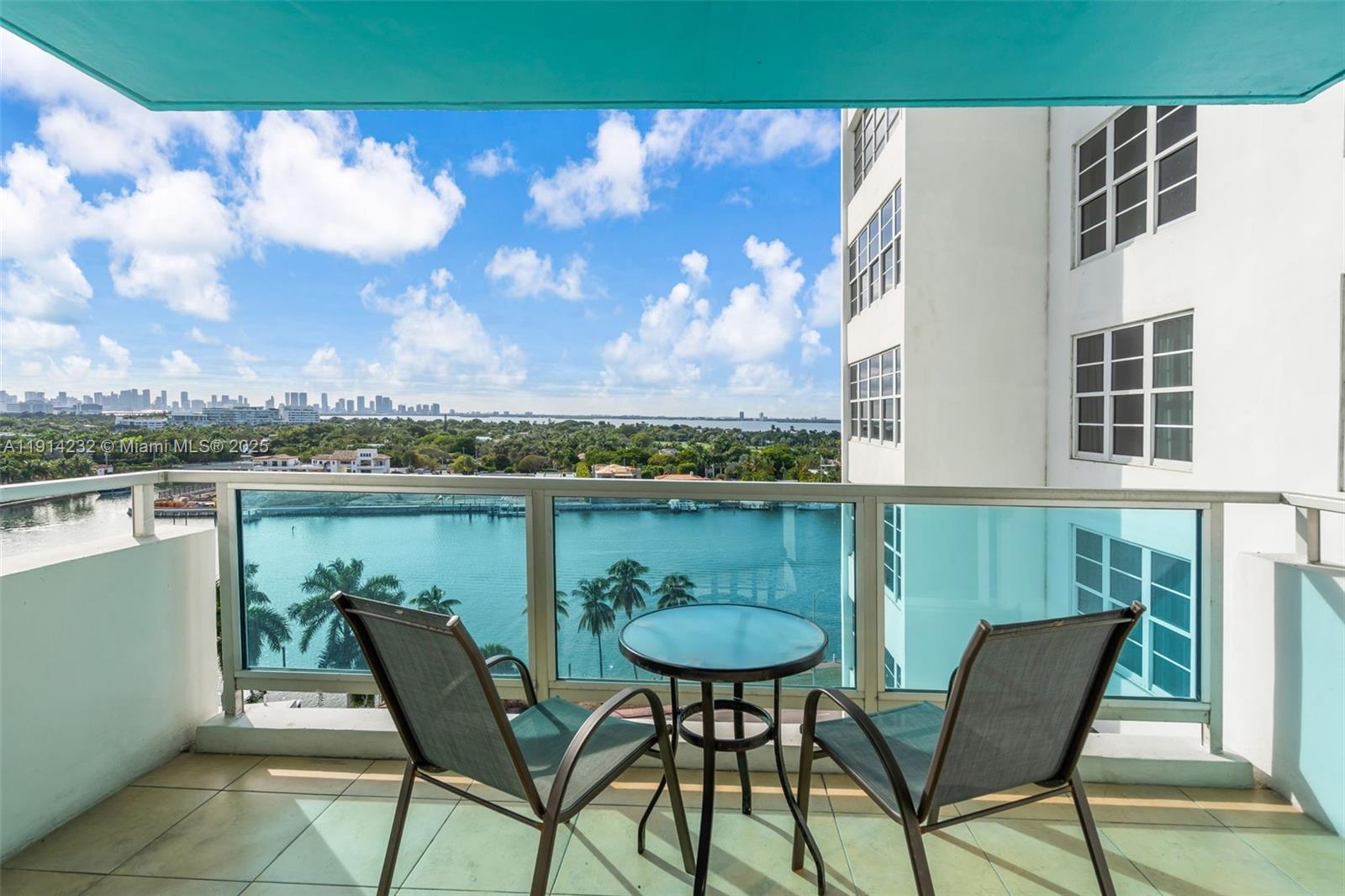 5101 Collins Avenue, Unit 12U Miami Beach, FL 33140 - Photo 9 of 26 a view of a chairs and table in the terrace
