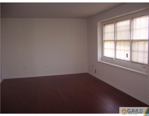 39 Roxy Avenue Edison, NJ 08820 - Photo 14 of 20 an empty room with a window