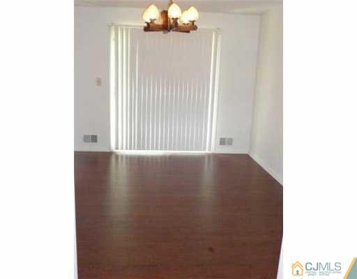 39 Roxy Avenue Edison, NJ 08820 - Photo 4 of 20 a view of a windows in a room