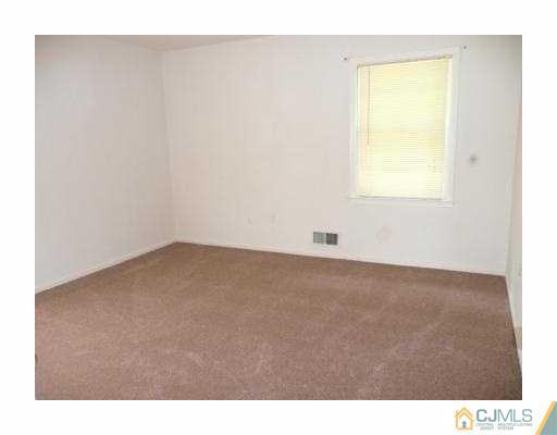 39 Roxy Avenue Edison, NJ 08820 - Photo 10 of 20 a view of an empty room with a window