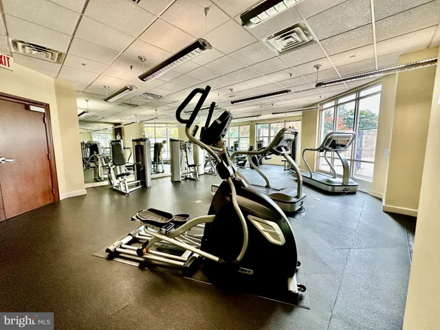 a gym room with gym equipment