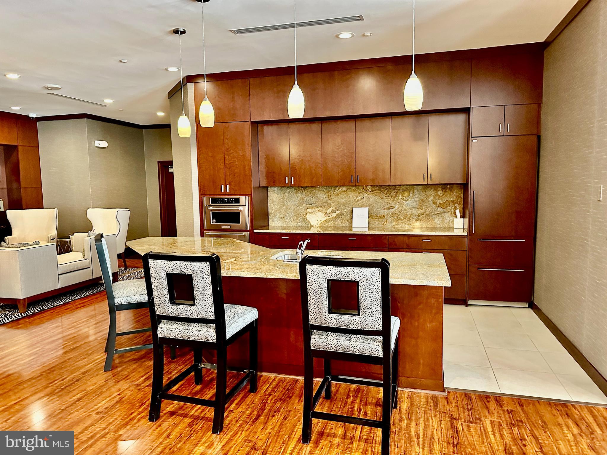 11760 Sunrise Valley Drive, Unit 512 Reston, VA 20191 - Photo 5 of 19 a view of a dining room with furniture