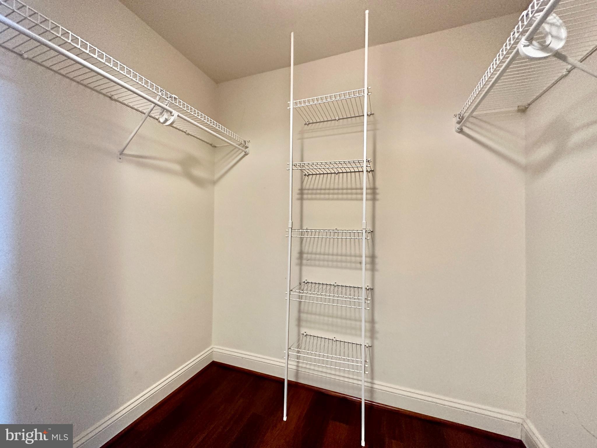 11760 Sunrise Valley Drive, Unit 512 Reston, VA 20191 - Photo 10 of 19 a view of walk in closet with empty racks