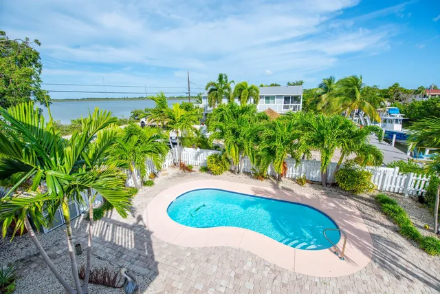 a view of a back yard of the house