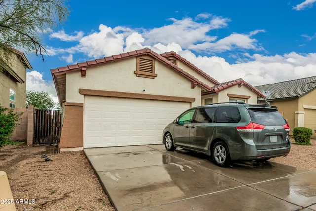 a car parked in front of a house
