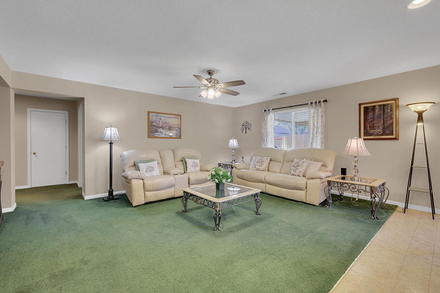 9840 Ellis Way Live Oak, CA 95953 - Photo 16 of 44 a living room with furniture and a chandelier