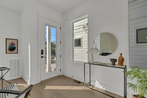 a bed room with a bed and a window