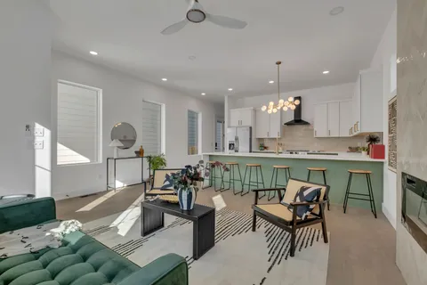 a dining room table with chairs