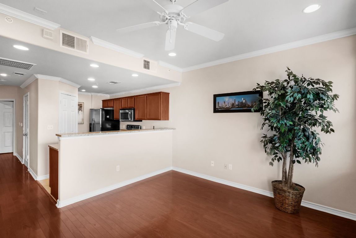 305 East 31st Street, Unit 6 Austin, TX 78705 - Photo 13 of 26 a view of kitchen with furniture and a potted plant