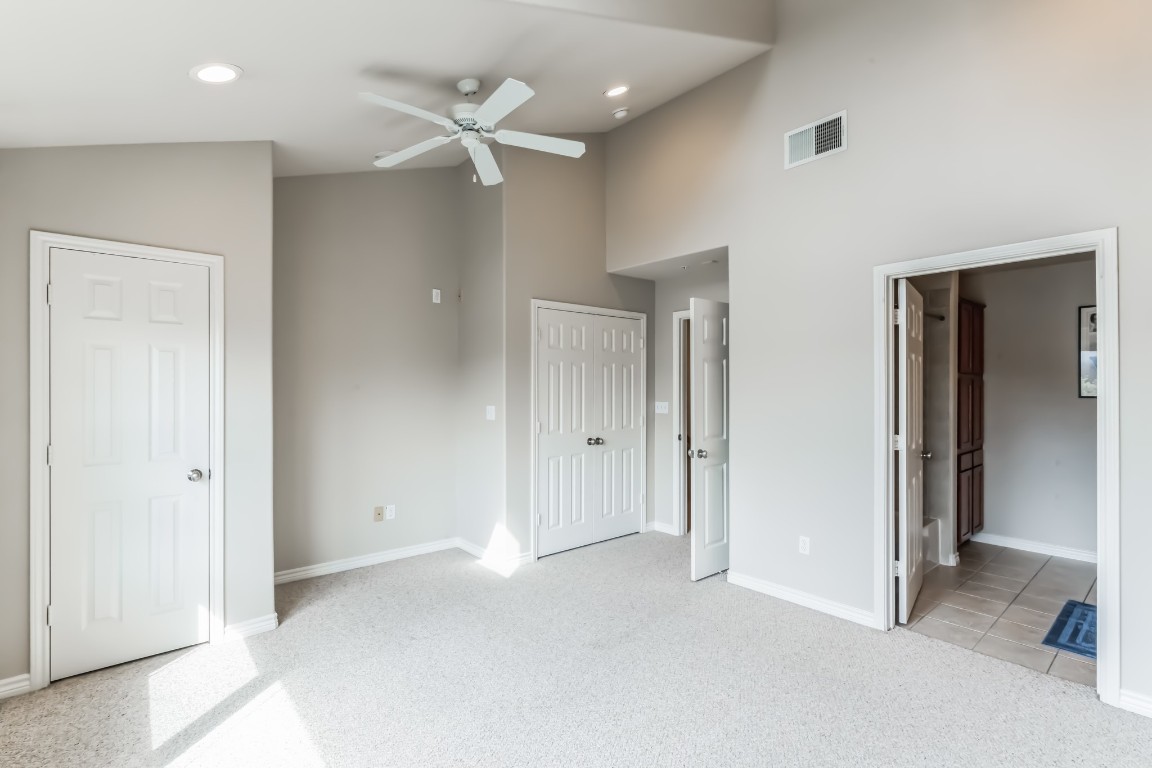 305 East 31st Street, Unit 6 Austin, TX 78705 - Photo 21 of 26 a view of a room with a ceiling fan and bathroom space