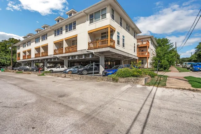a front view of a building with street view