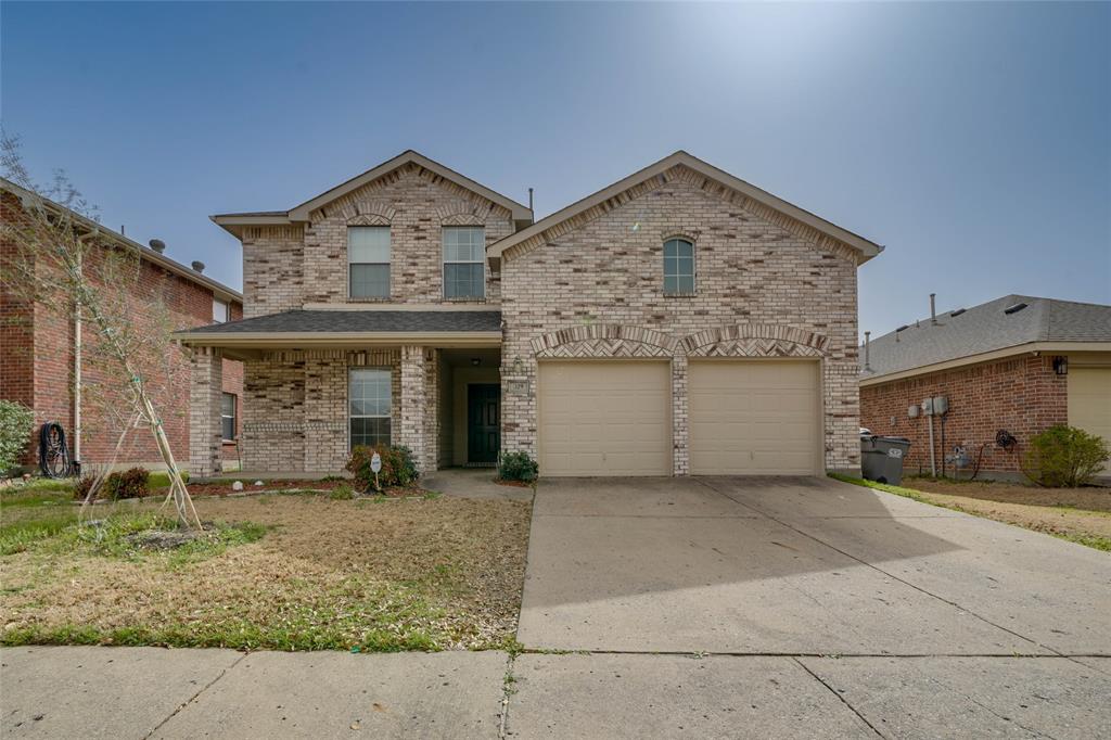 329 Highland Glen Trail Wylie, TX 75098 - Photo 1 of 34 Traditional-style home with brick siding, concrete driveway, and a garage