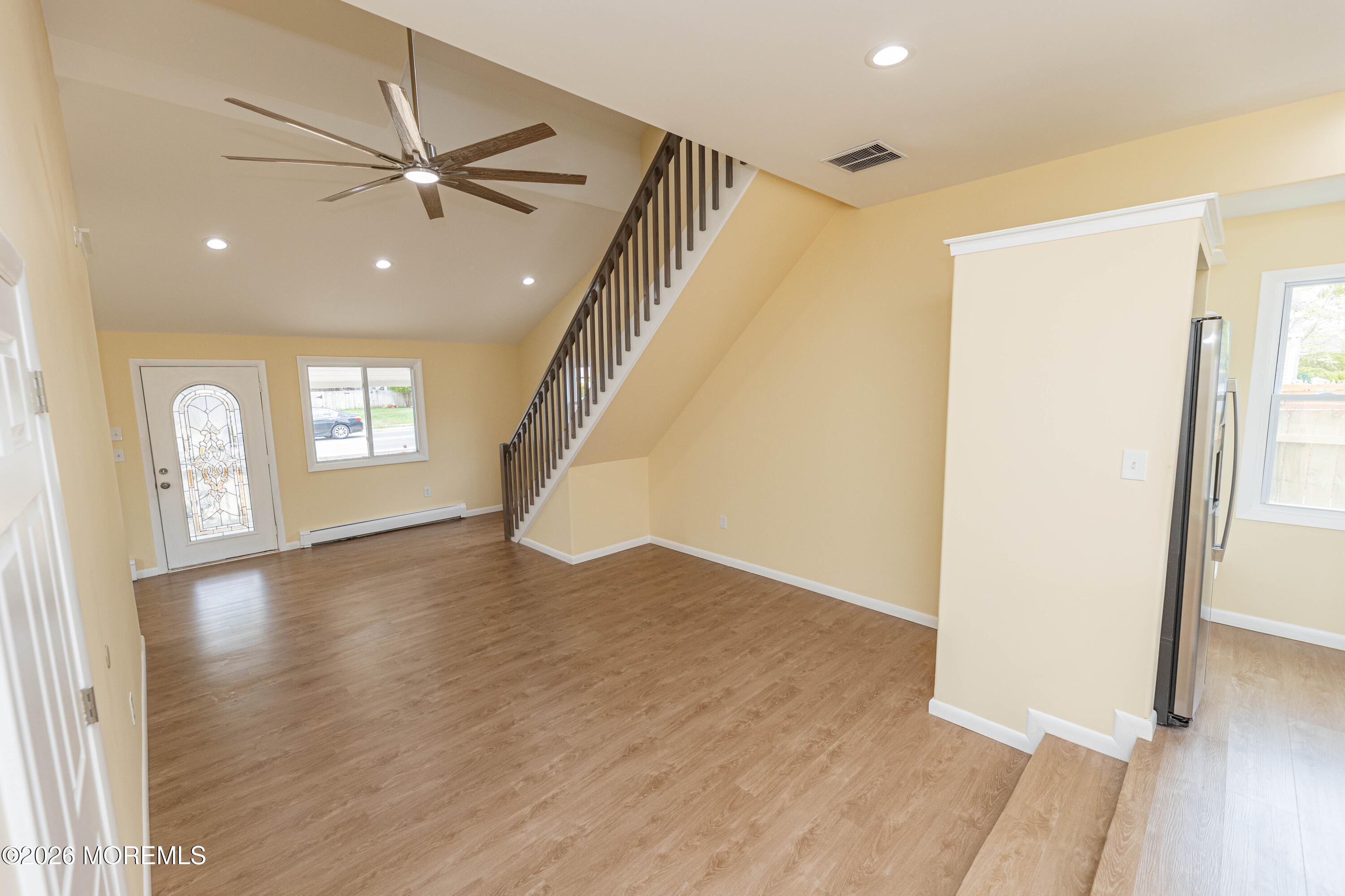 2408 Herbertsville Road Point Pleasant, NJ 08742 - Photo 21 of 82 a view of empty room with wooden floor and fan