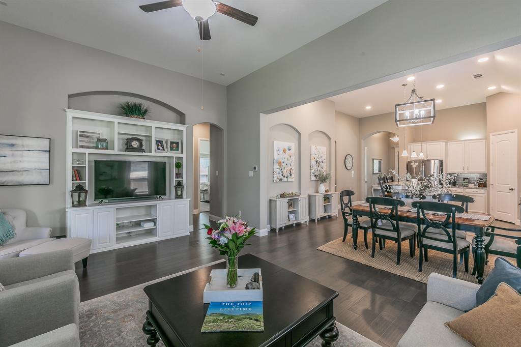 14804 Cedar Flat Way Fort Worth, TX 76262 - Photo 13 of 35 a living room with furniture kitchen view and a flat screen tv