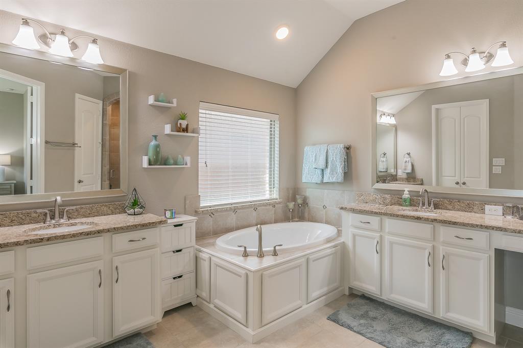 14804 Cedar Flat Way Fort Worth, TX 76262 - Photo 18 of 35 a bathroom with a granite countertop bathtub sink double and mirror