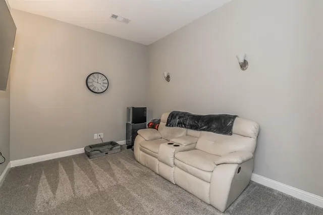 a bed room with a bed and a window