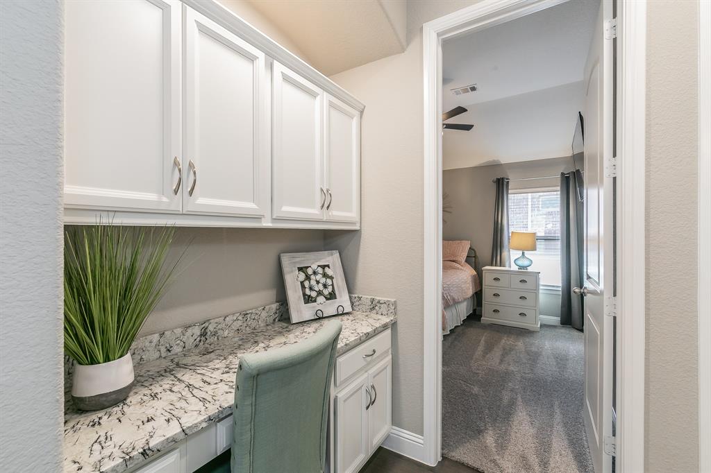 14804 Cedar Flat Way Fort Worth, TX 76262 - Photo 24 of 35 a kitchen with a white cabinets and potted plant
